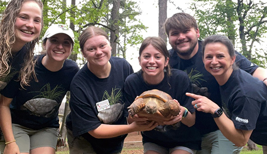 Educators with Digger — Rock Eagle's superstar Gopher Tortoise.